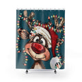 Shower curtain with a reindeer wearing a Santa hat and surrounded by Christmas lights on a blue background.